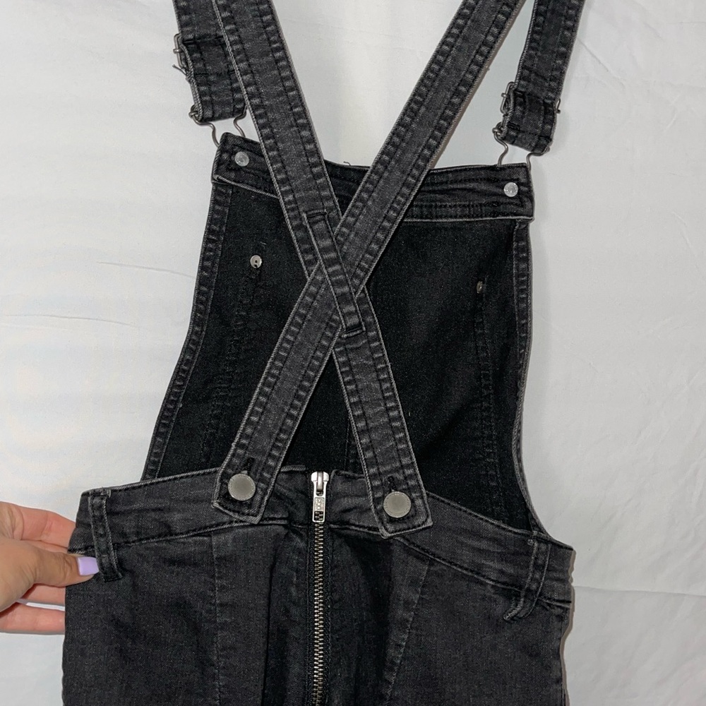 Washed-dark grey jean overalls. Size 4